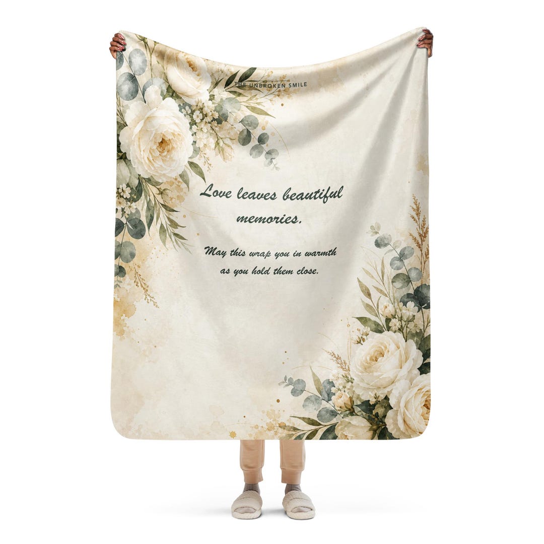 Sympathy Comfort Blanket, a 50 by 60 sherpa throw with white roses, a bereavement gift, shown with The Long Goodbye journal